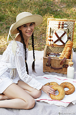 Brunette posing outdoors